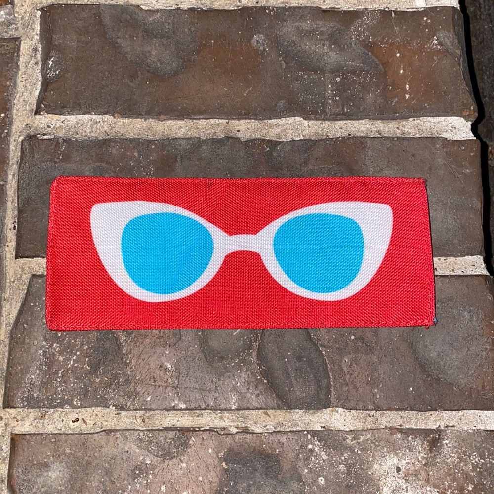 Glasses or sunglasses holder. Super cute!